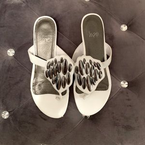 White flip flops by IMPO